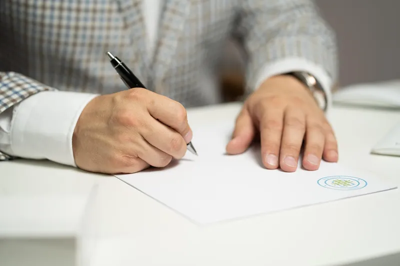 Person signing legal document